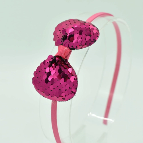 Haarband boog met pailletten fuchsia
