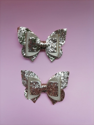 Haarspelden goud strikken met glitters 