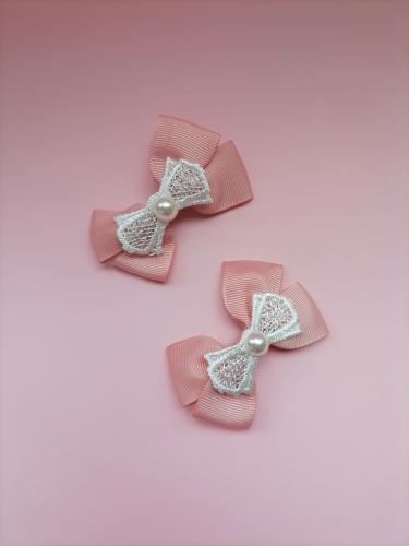 Haarspelden roze strikken 