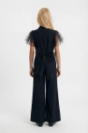 Blair zwarte meisjes jumpsuit zijaanzicht, elegant silhouet tiener, bruiloftskledij